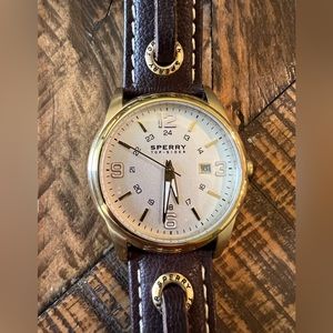 Brown and gold men’s sperry watch